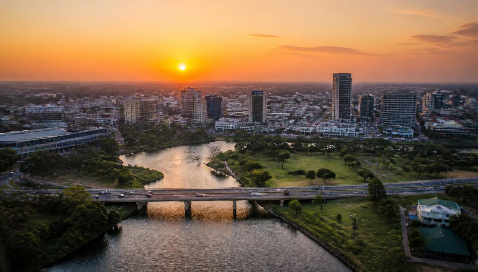 Aerial view of the Lusaka skyline and river at sunset